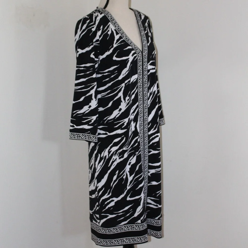 Dana Buchman, sheath dress with 3/4 sleeves